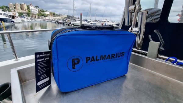 The Palmarius Jig Case in Blue. A fully licenced product from hPA France. Comes with x4 double sided card inserts, a reel case with zipped mesh compartment, mesh storage in the lid and shoulder strap.