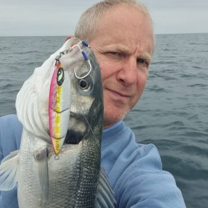 A solid bass on the Pink Silver Glow JOKER IMP slow pitch jig, 120g